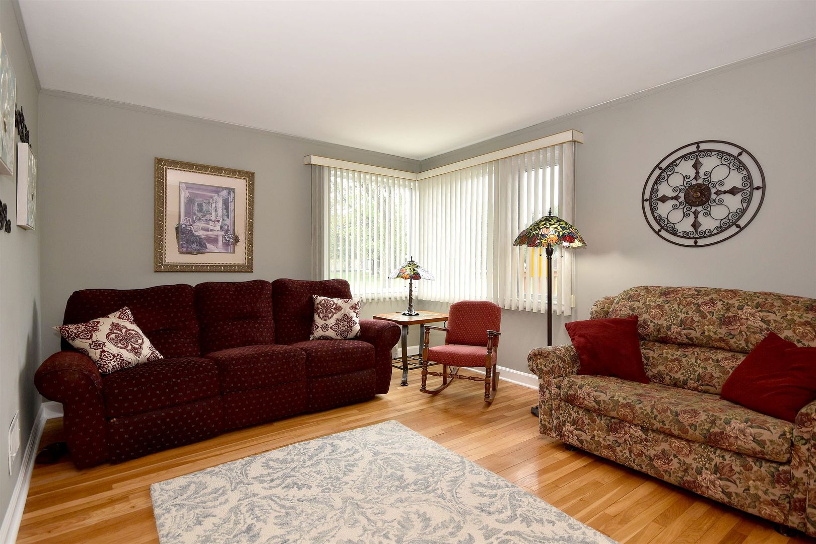 8423 Riverside Avenue Brookfield, IL 60513 - Photo 6 of 28 a living room with furniture a rug and a window