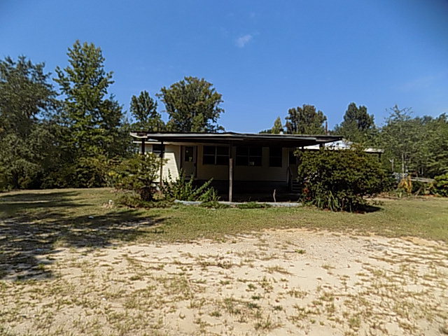 3294 South Lizella Road Lizella, GA 31052 - Photo 4 of 17 a front view of a house with a yard