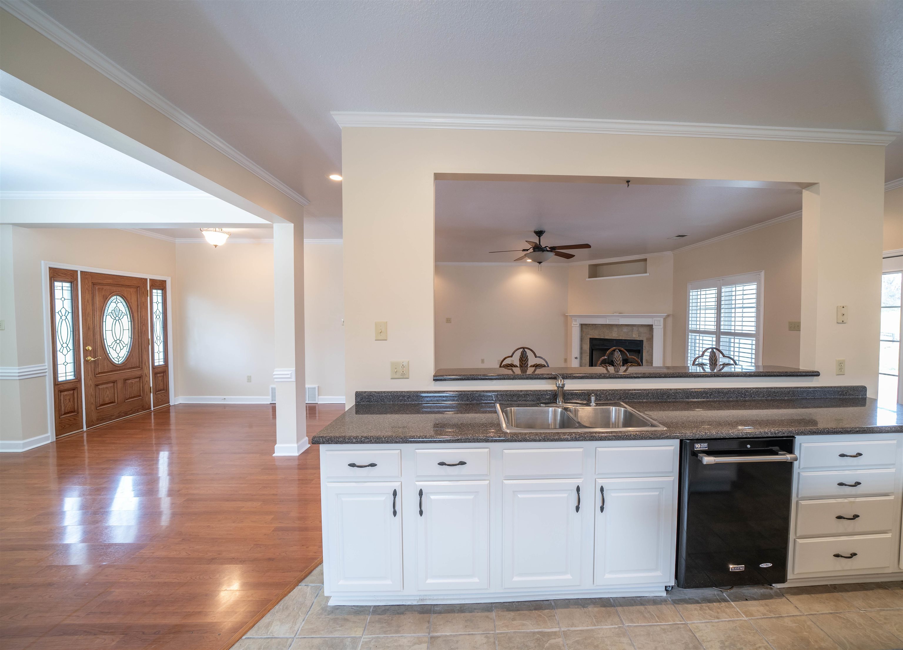 3740 Charles Bartlett Road Millington, TN 38053 - Photo 14 of 36 a kitchen with granite countertop a stove and cabinets