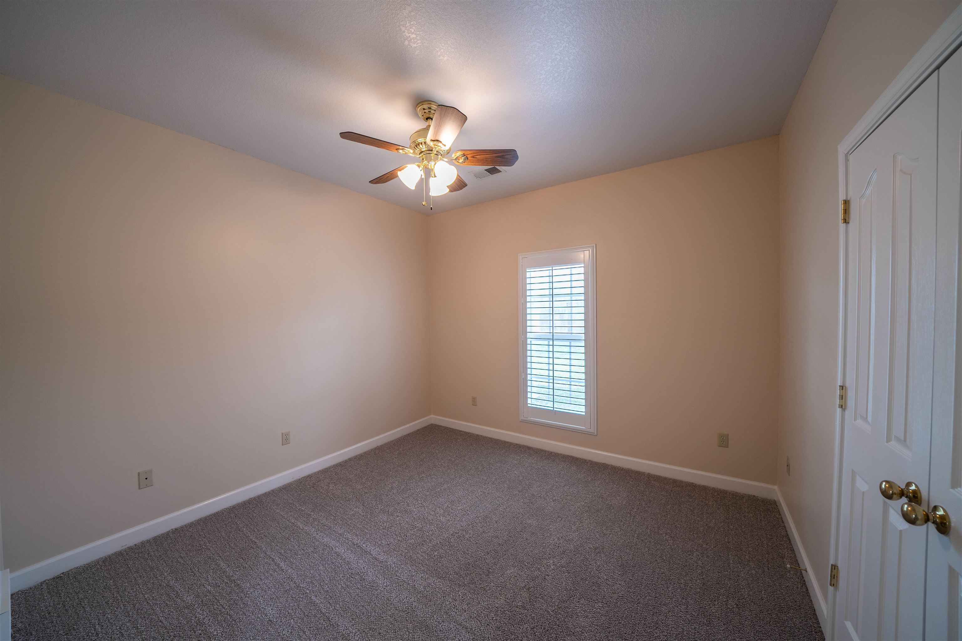 3740 Charles Bartlett Road Millington, TN 38053 - Photo 23 of 36 wooden floor in an empty room with a window