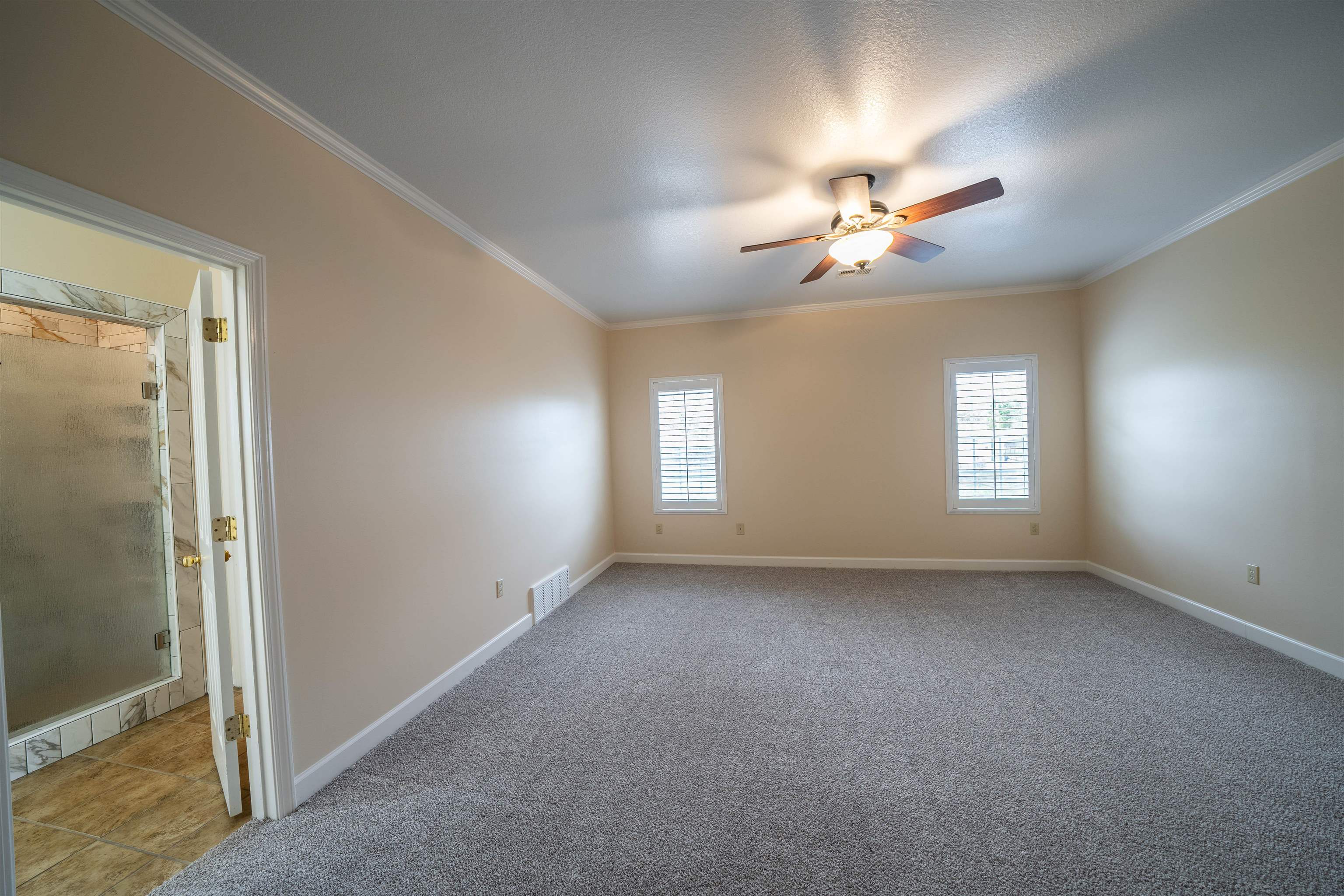 3740 Charles Bartlett Road Millington, TN 38053 - Photo 24 of 36 a view of room with ceiling fan and window