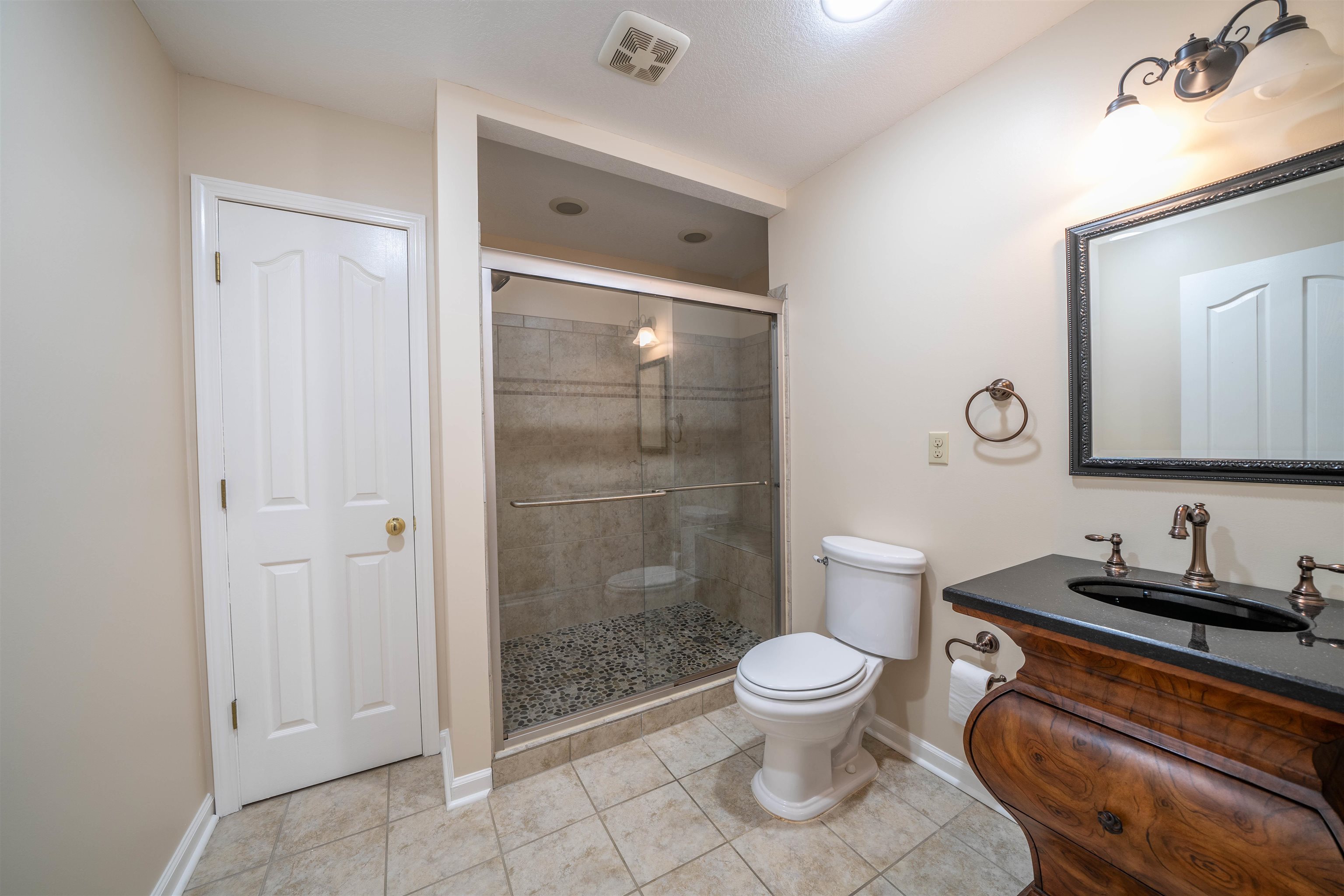 3740 Charles Bartlett Road Millington, TN 38053 - Photo 35 of 36 a bathroom with a toilet sink and shower