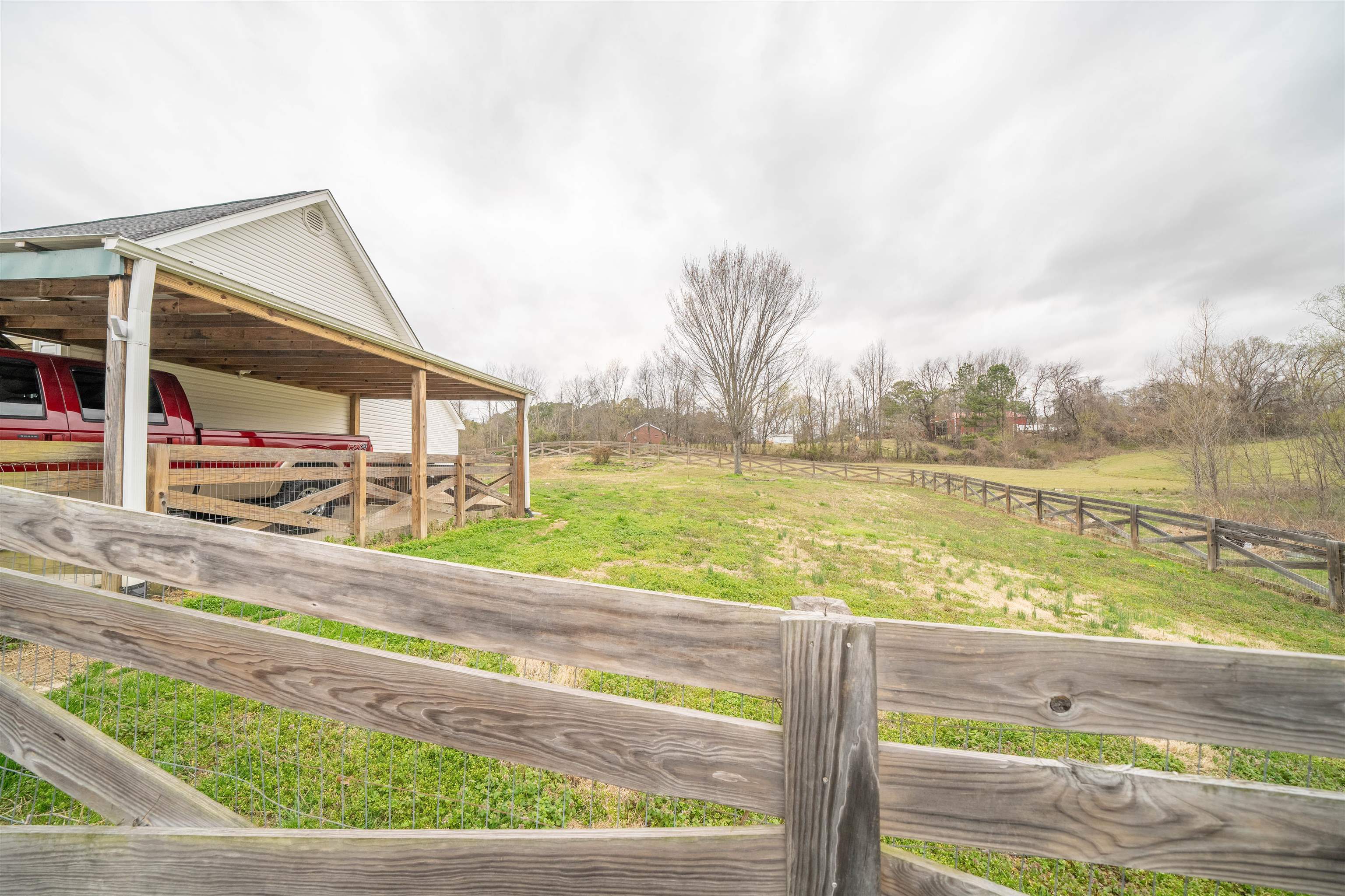 3740 Charles Bartlett Road Millington, TN 38053 - Photo 5 of 36 a view of swimming pool with a yard