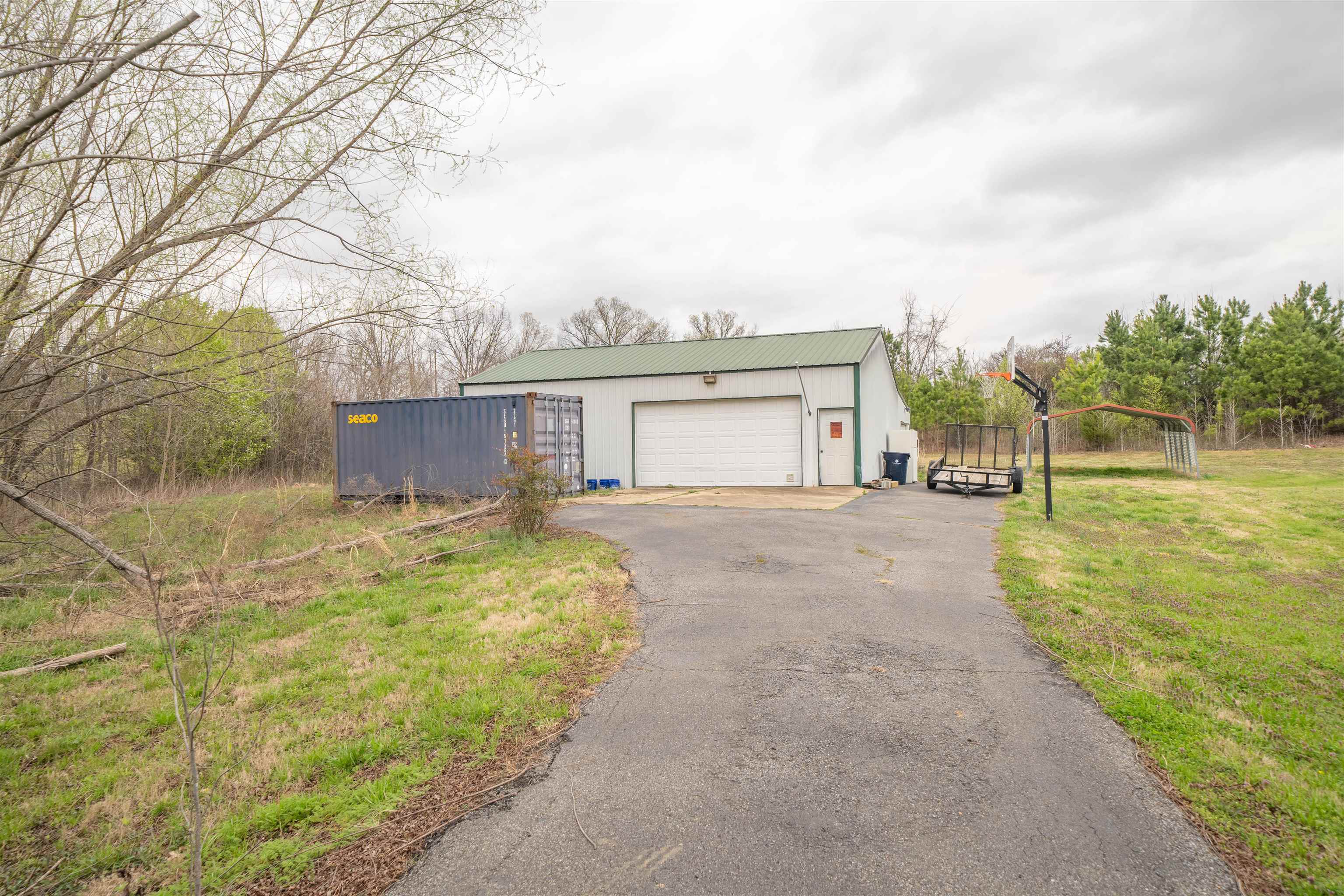 3740 Charles Bartlett Road Millington, TN 38053 - Photo 6 of 36 front view of a house with a yard