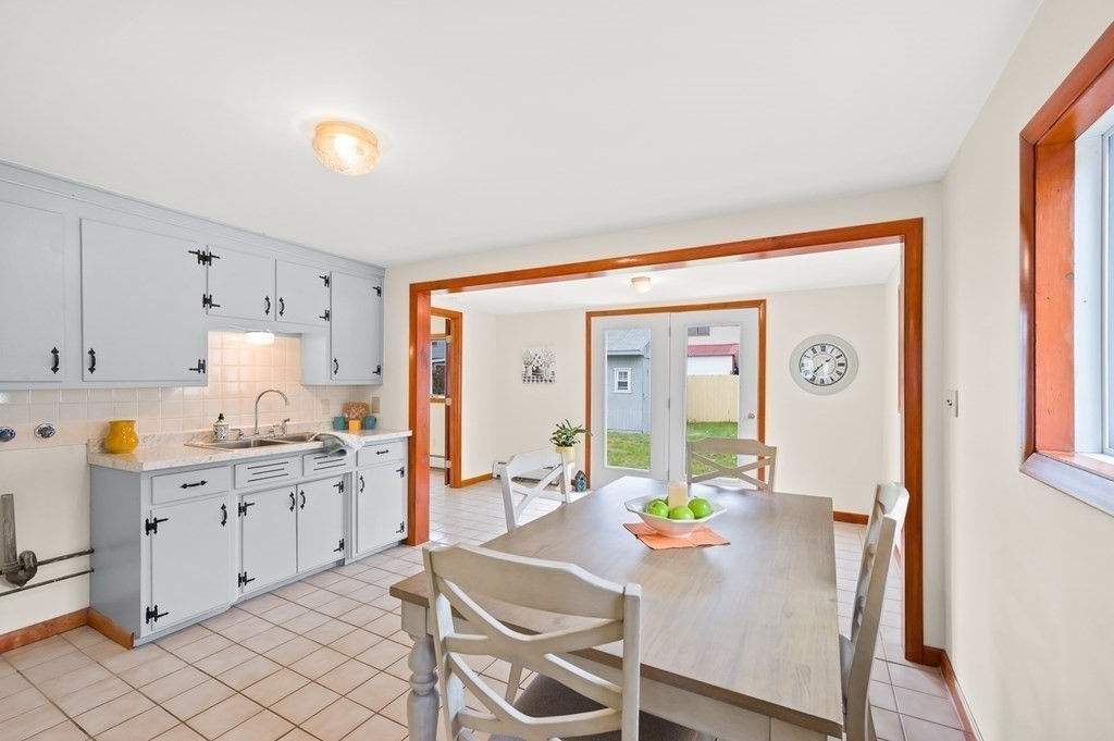 53 Merrill Road Springfield, MA 01119 - Photo 8 of 30 a kitchen with stainless steel appliances granite countertop a sink and cabinets