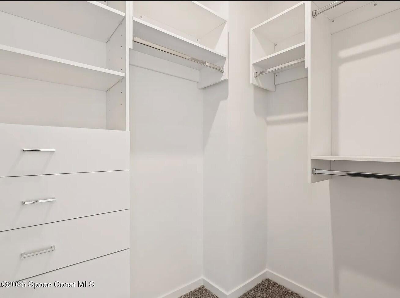 1073 Journey Circle, Unit 201 Rockledge, FL 32955 - Photo 10 of 10 a view of a walk in closet