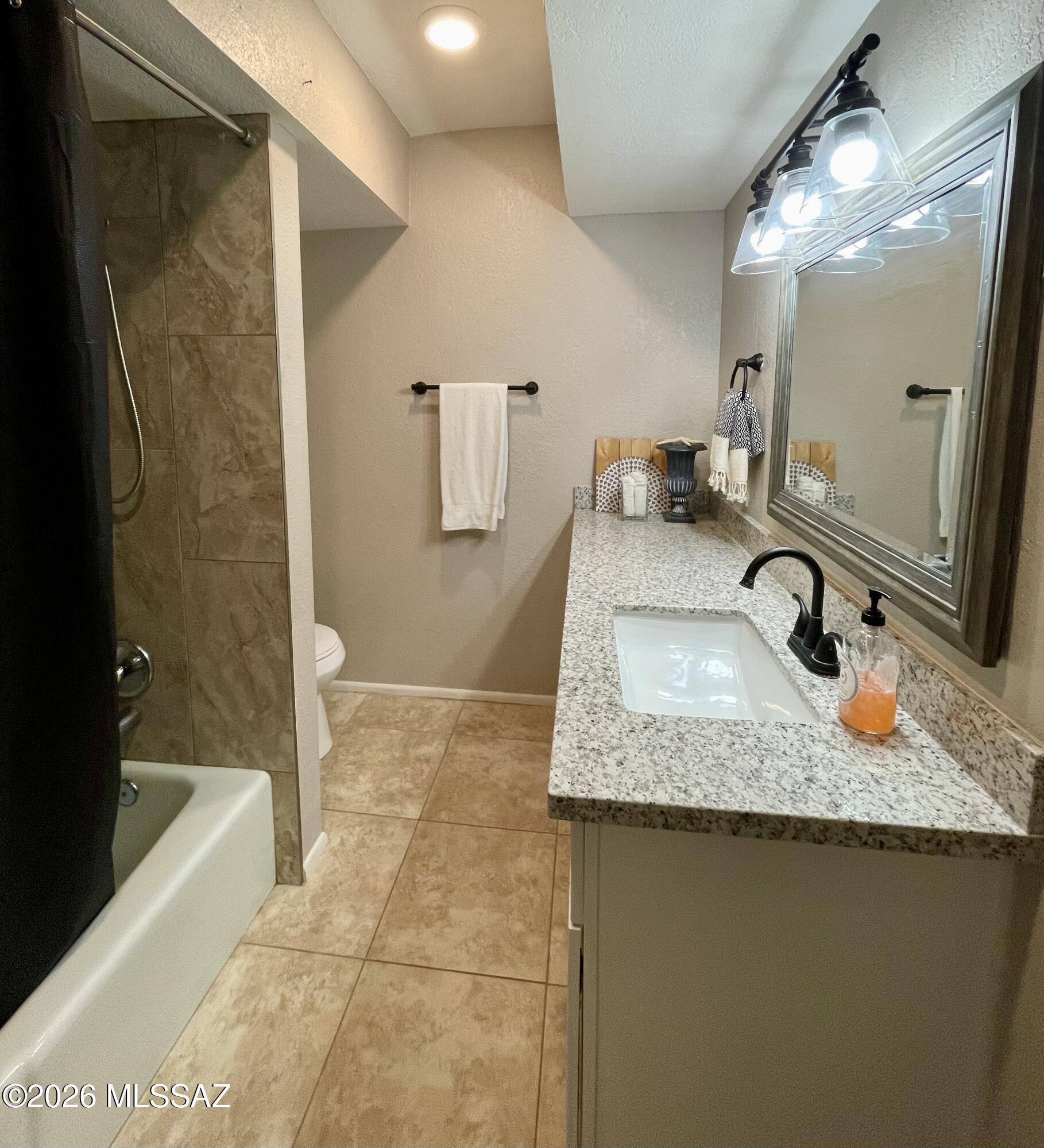 2434 North Shade Tree Circle Tucson, AZ 85715 - Photo 20 of 20 tub/shower and granite vanity countertop