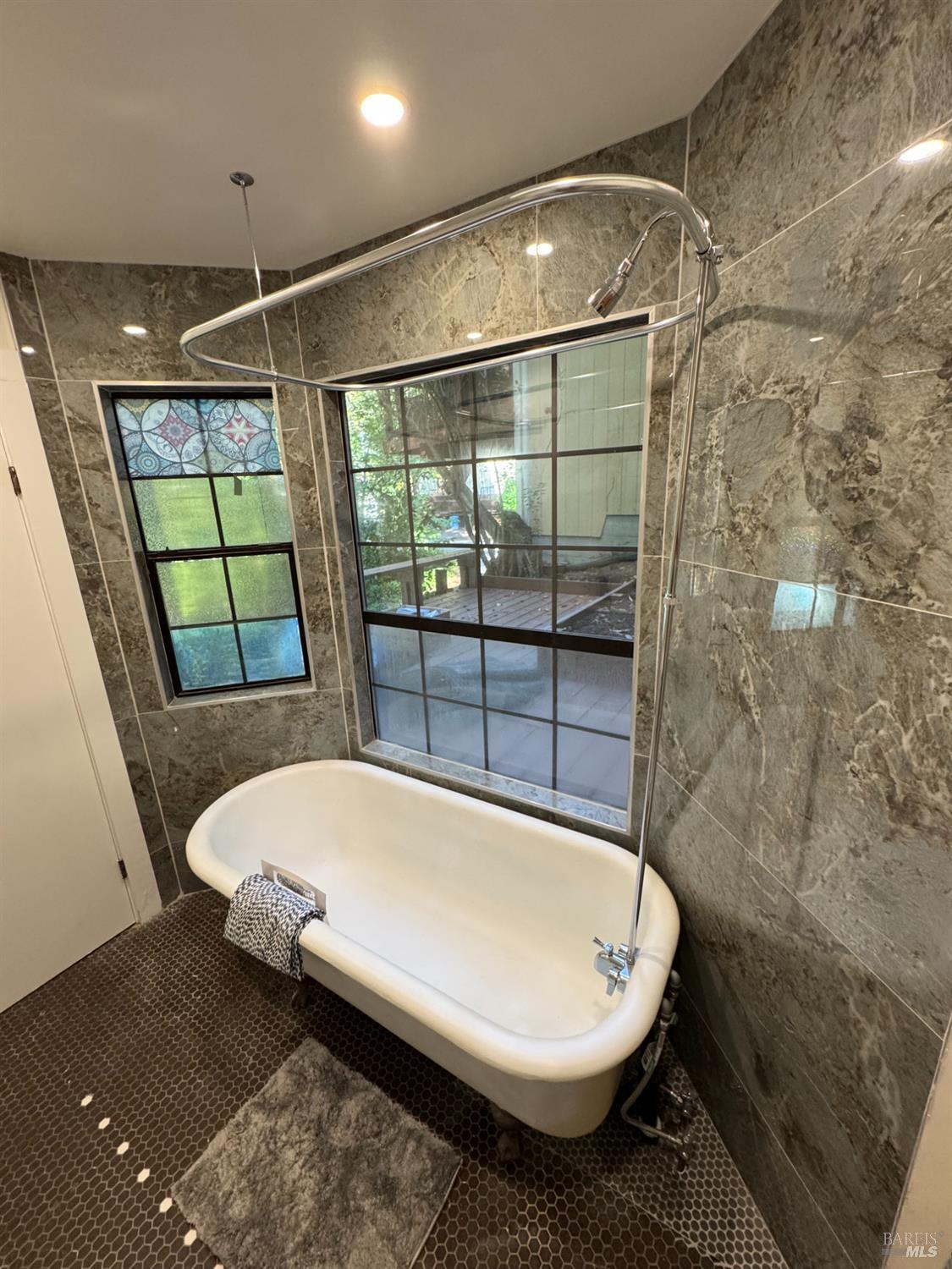 14652 Canyon 1 Road Guerneville, CA 95446 - Photo 10 of 14 a bathroom with a bathtub and shower