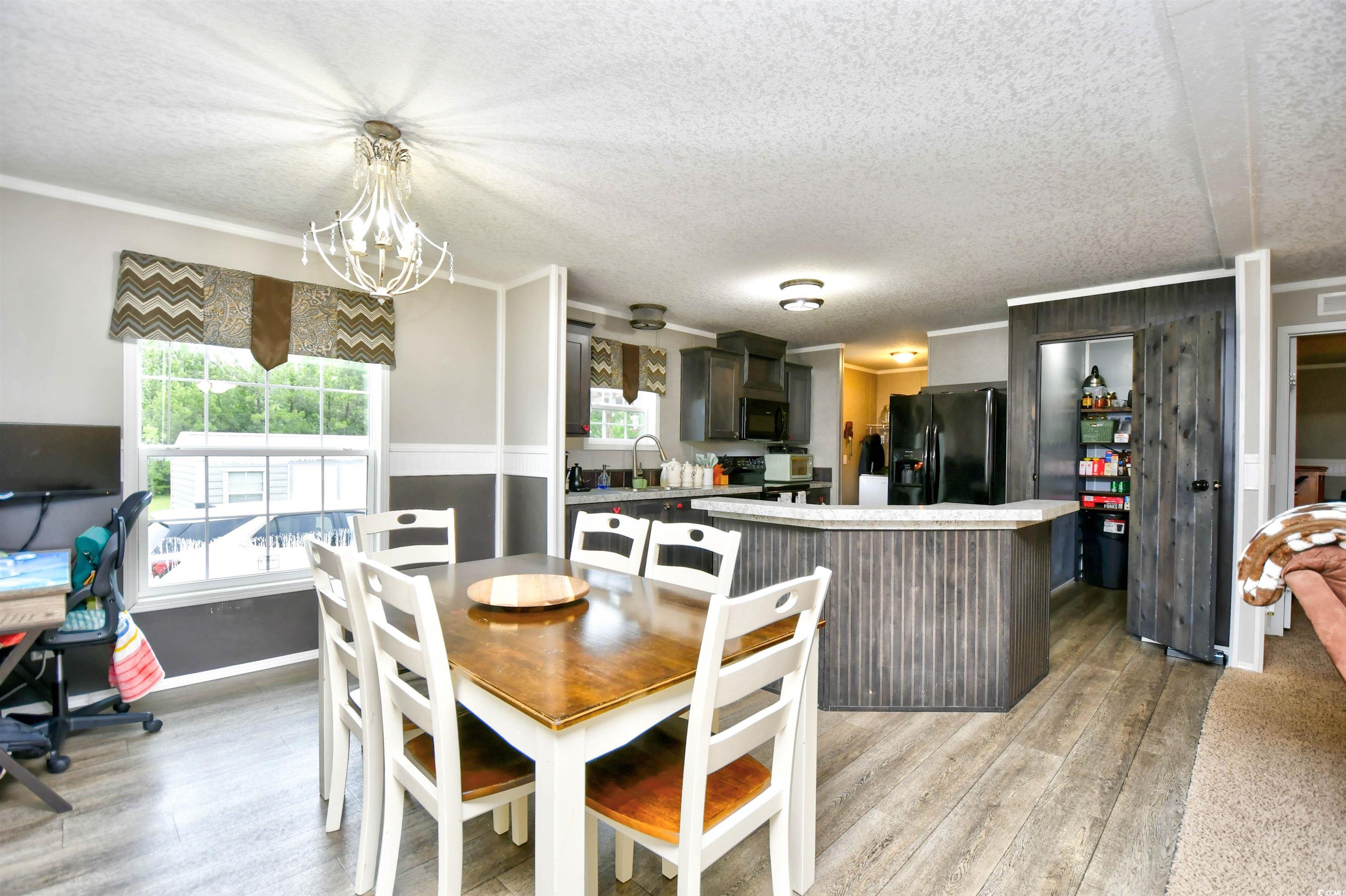 2296 Bakers Chapel Road Aynor, SC 29511 - Photo 8 of 28 Dining space featuring a textured ceiling, a notab