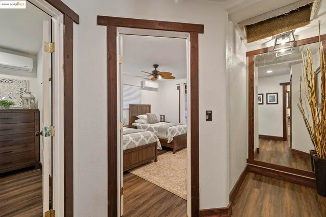 a view of water with boats and trees around