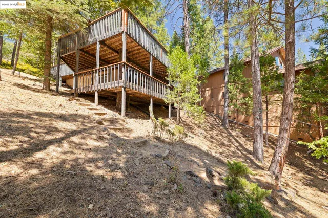 a view of a swimming pool with an outdoor space and seating area