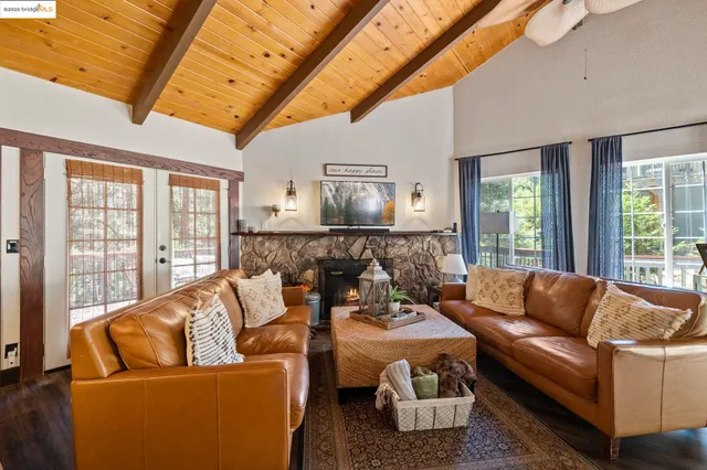 a bathroom with a double vanity sink mirror and toilet