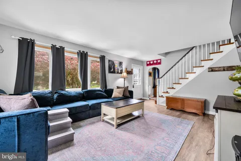 a living room with furniture and a couch