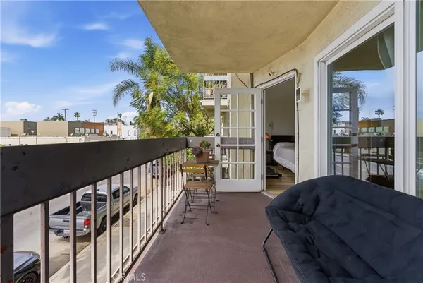 a view of a hallway with washer and dryer