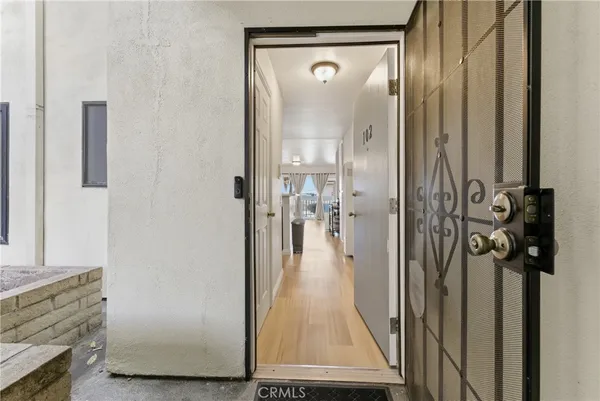a view of a bathroom from the hallway