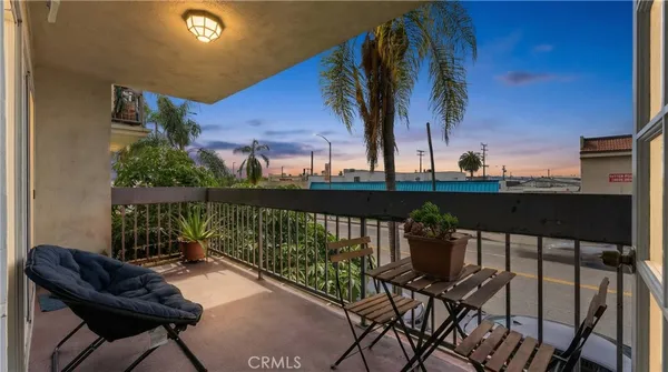 a living room with furniture fireplace and flat screen tv