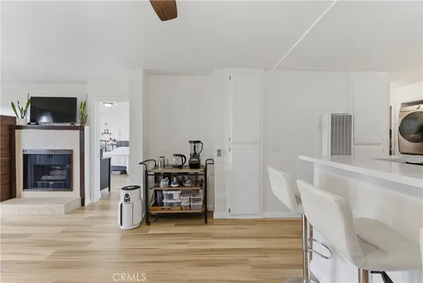 a view of livingroom with furniture and fireplace