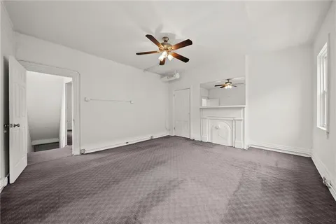 a view of an empty room with window