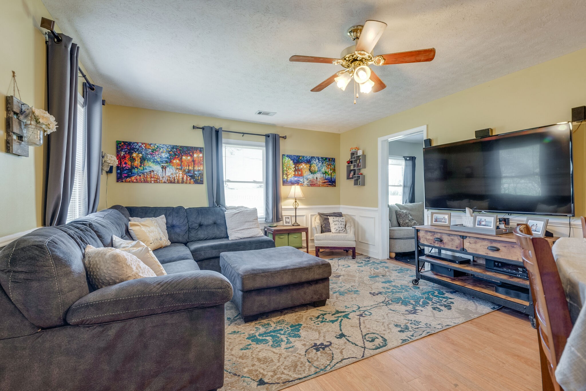 2491 Double Log Cabin Road Lebanon, TN 37087 - Photo 16 of 31 a living room with furniture and a flat screen tv