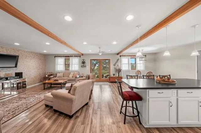 a living room with furniture and a table