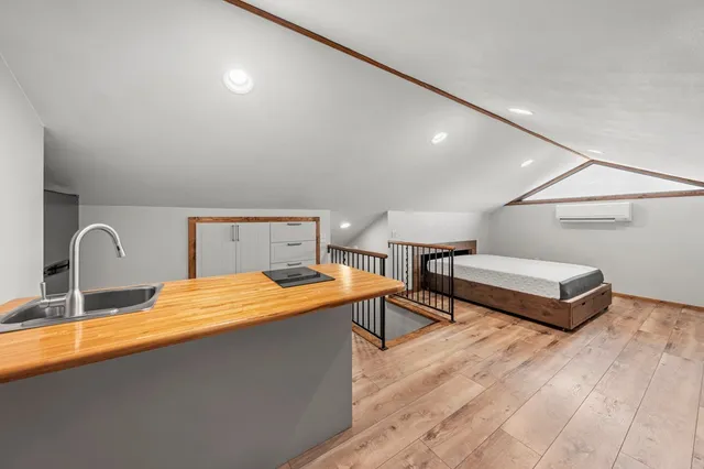 a close view of a sink and refrigerator