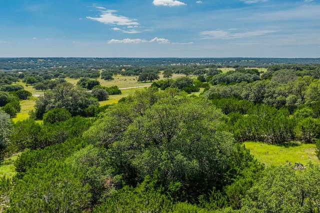 a view of a green field with lots of green space