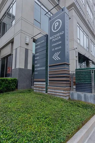 a view of a street sign of a building