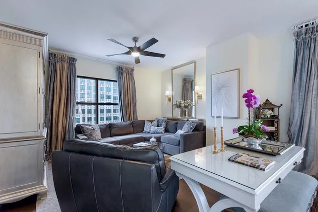 a living room with furniture and a window