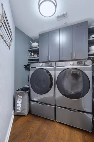 a view of a kitchen with a sink and dishwasher