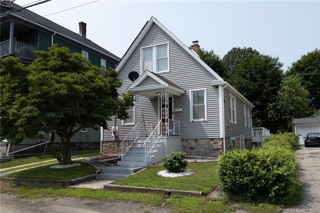 12 Geddes Terrace Waterbury, CT 06708 - Photo 1 of 1 a front view of house with yard and green space