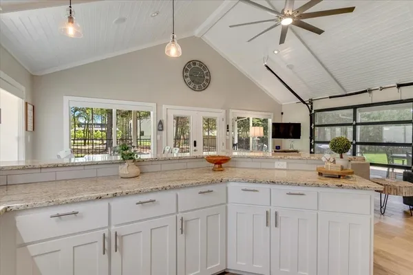 a kitchen with sink and window