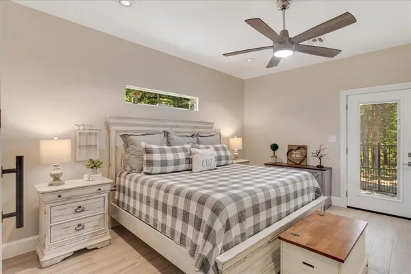 a bedroom with a bed and a dresser