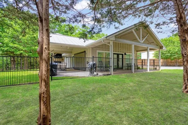 a house view with a garden space