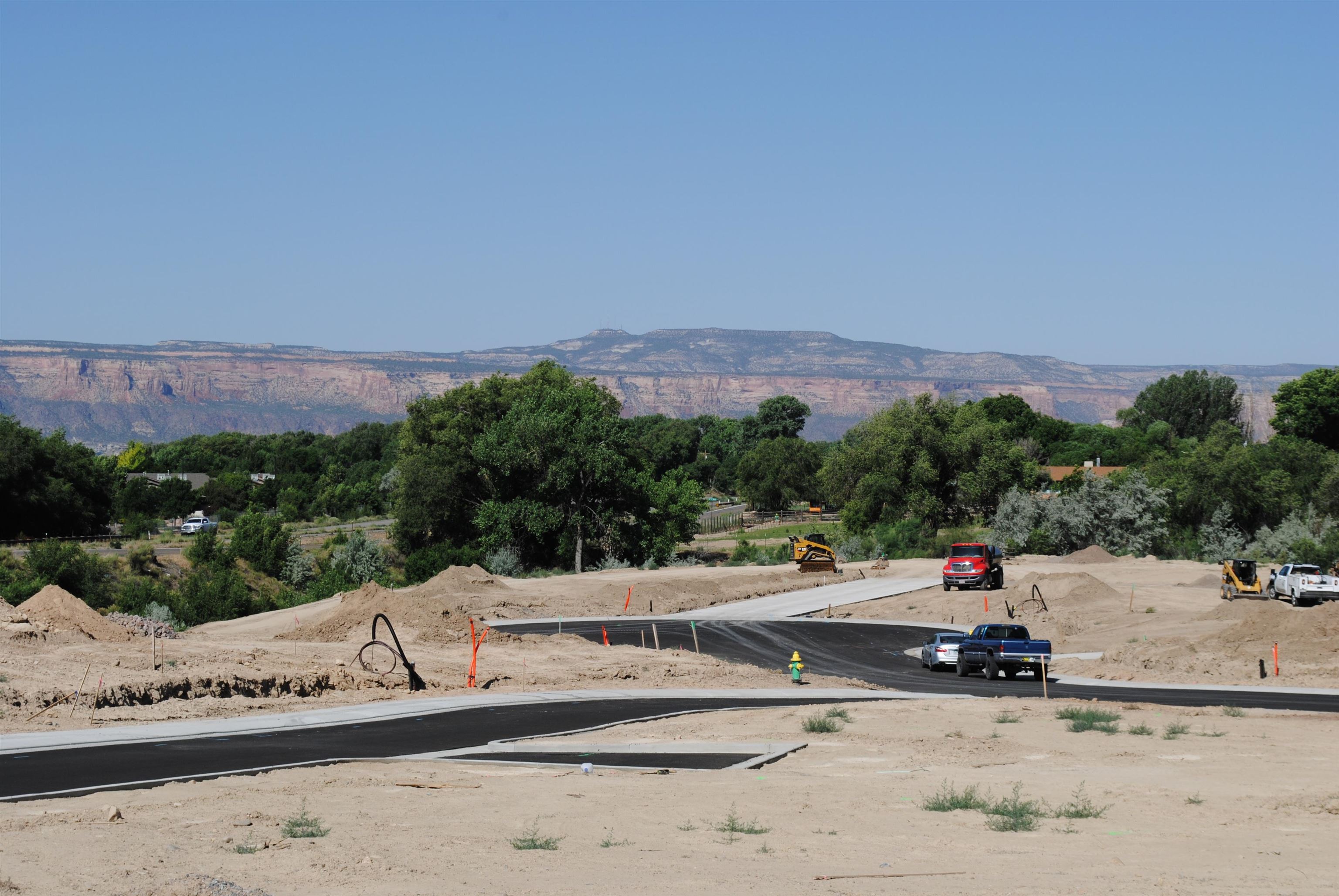 Lot 4 Maroon Creek Loop Grand Junction, CO 81505 - Photo 3 of 20 a view of a road with a mountain in the background