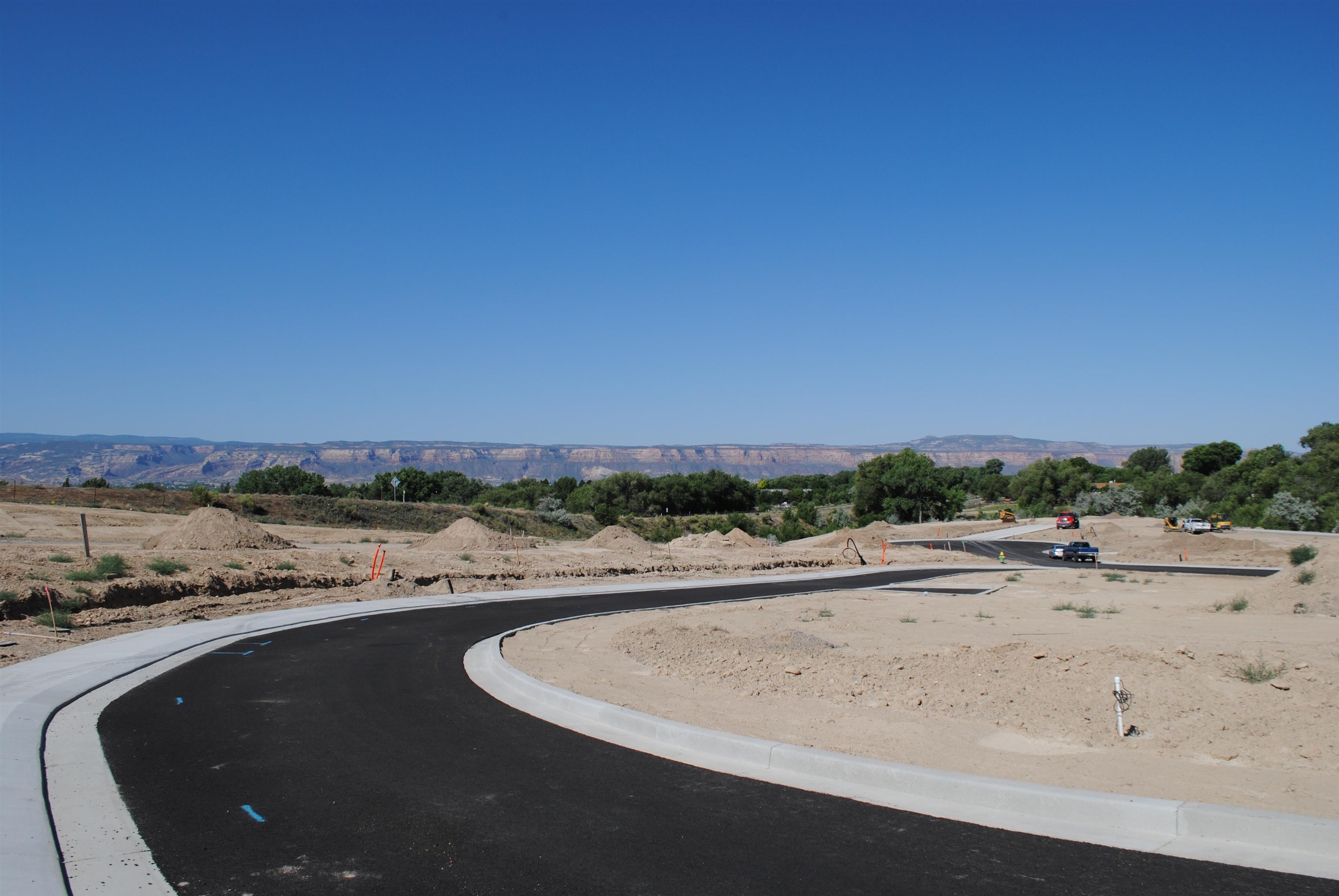 Lot 4 Maroon Creek Loop Grand Junction, CO 81505 - Photo 4 of 20 a view of a lake with a beach