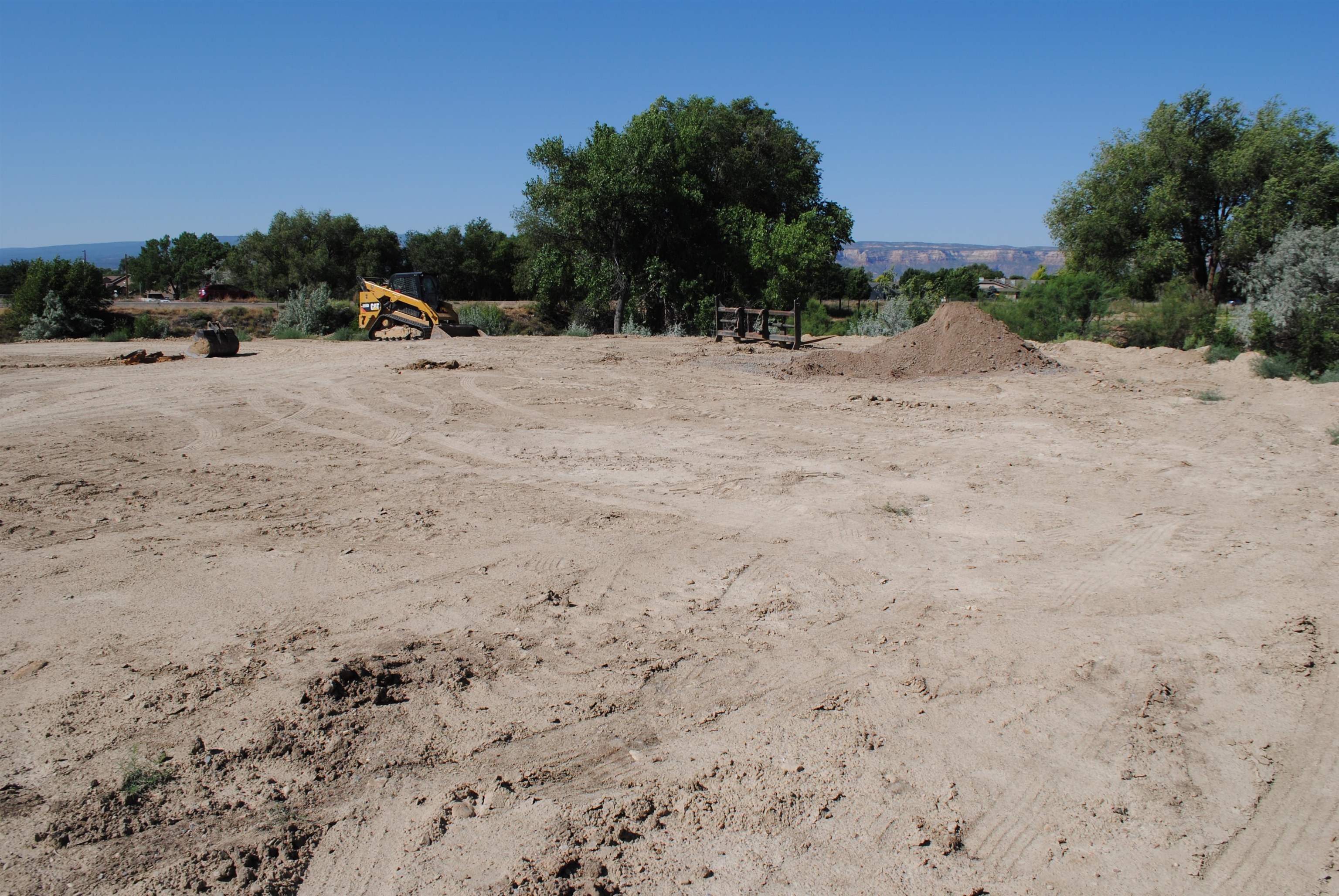 Lot 4 Maroon Creek Loop Grand Junction, CO 81505 - Photo 10 of 20 a view of a dry yard with trees