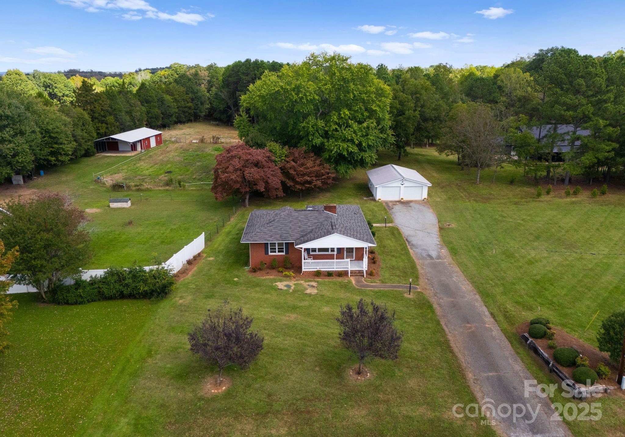 5170 Woodleaf Road Salisbury, NC 28147 - Photo 1 of 13 a aerial view of a house