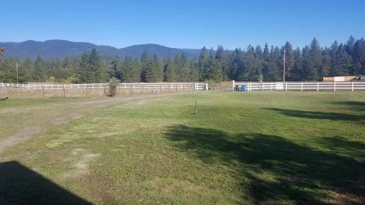 205 Latigo Ranch Road Williams, OR 97544 - Photo 32 of 50 Front yard and vinyl fencing all along front of property