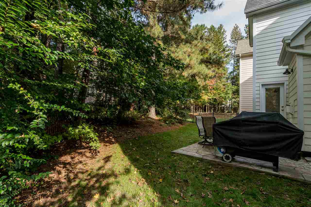 8407 Wheatstone Lane Raleigh, NC 27613 - Photo 26 of 28 Wooded yard