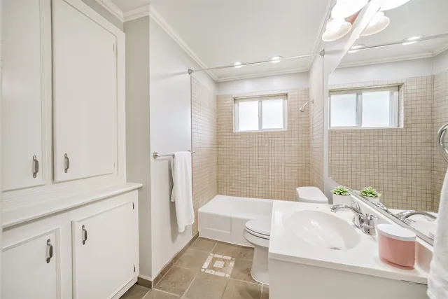 a bathroom with a sink and a bathtub