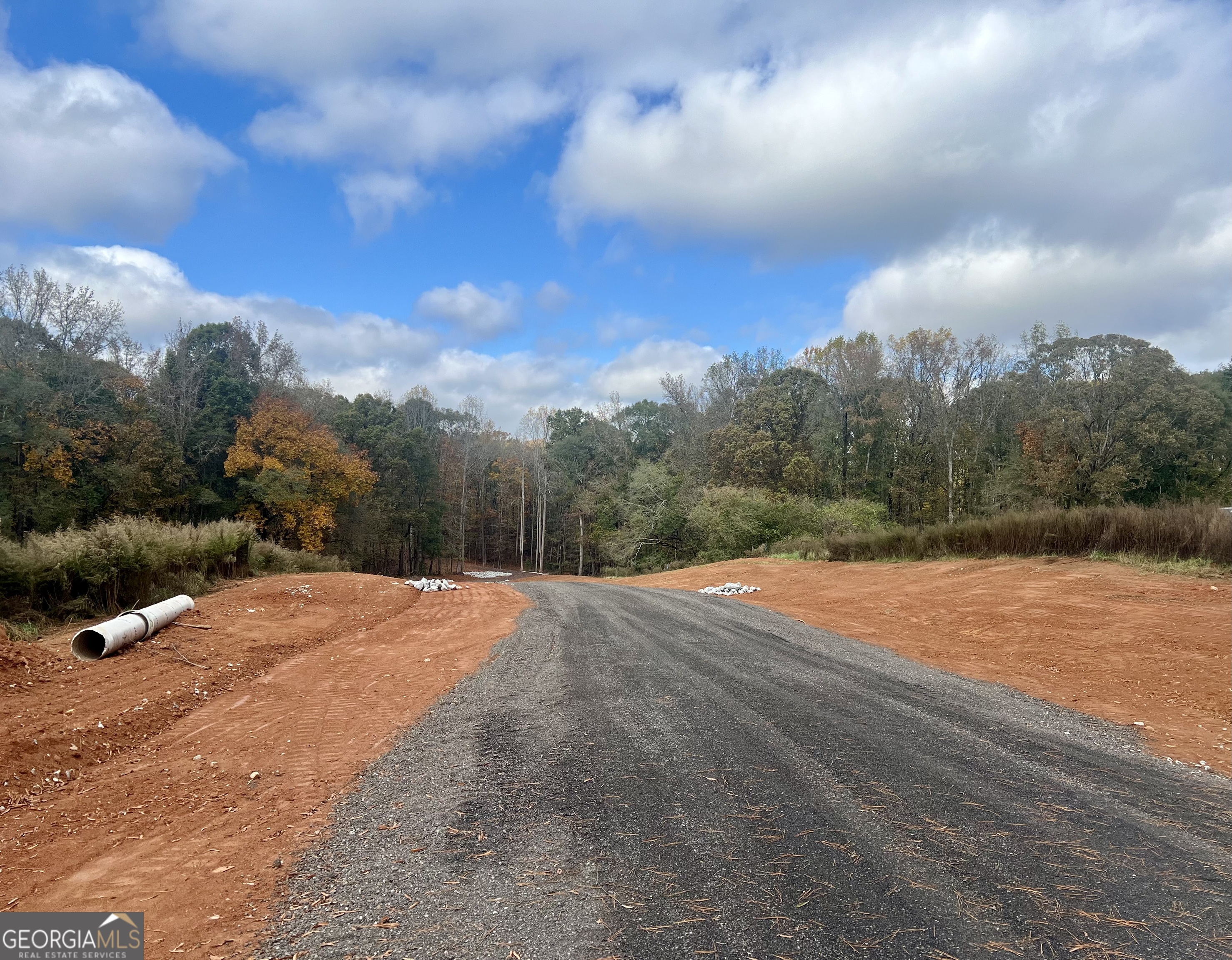 4023 Jersey Covington Road Covington, GA 30014 - Photo 2 of 6 a view of an outdoor space and tennis court