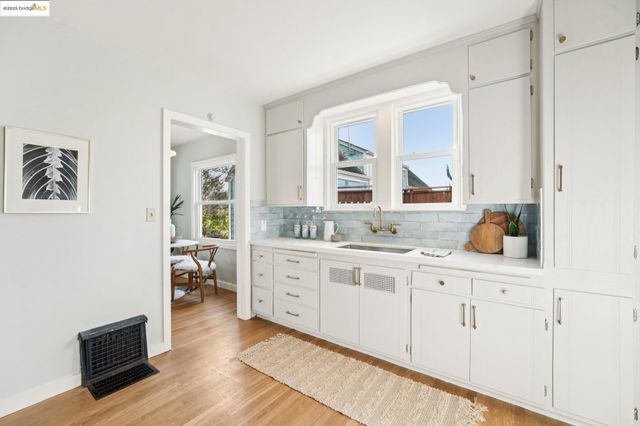 a spacious bathroom with a double vanity sink and a mirror