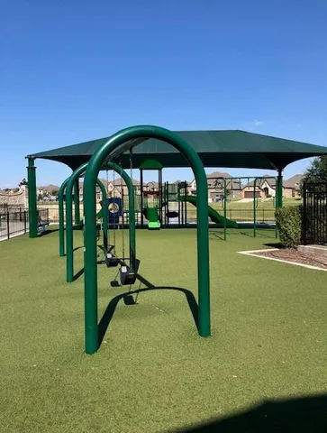 a view of a swimming pool with an outdoor seating