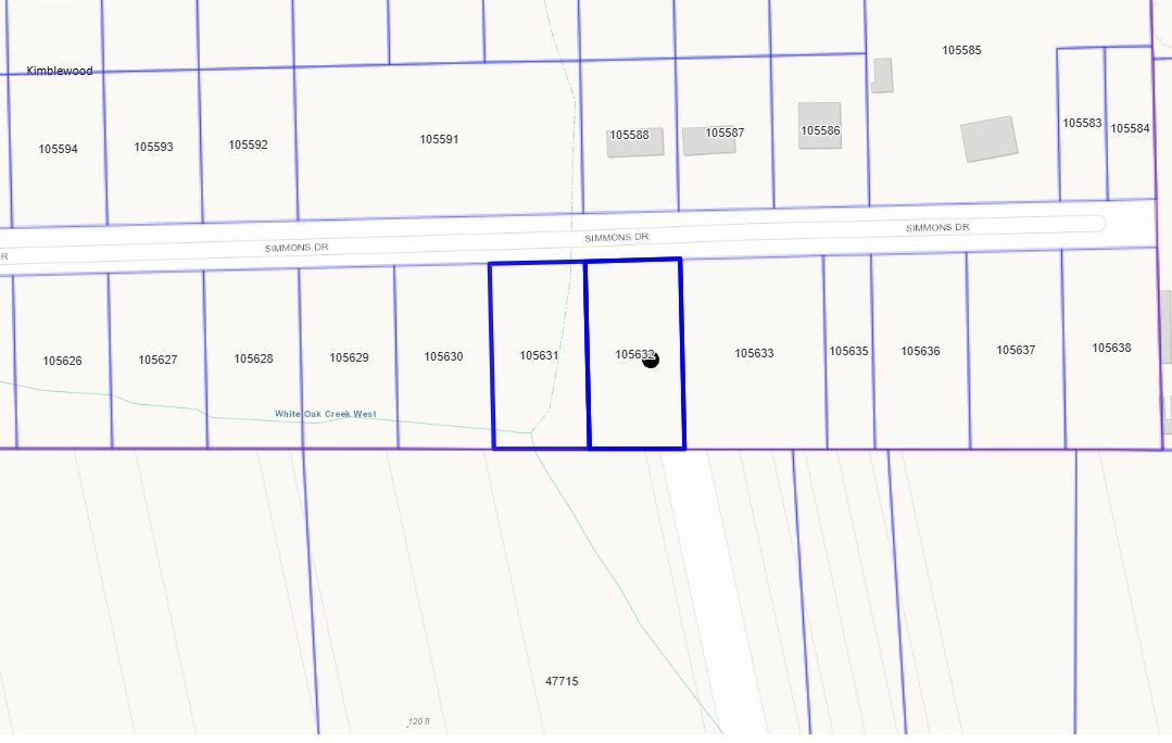 Tbd Simmons Drive Conroe, TX 77385 - Photo 4 of 6 a picture of a black and white wall