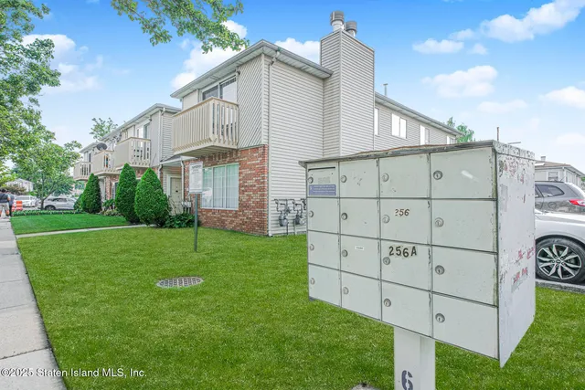 a view of a back yard of the house