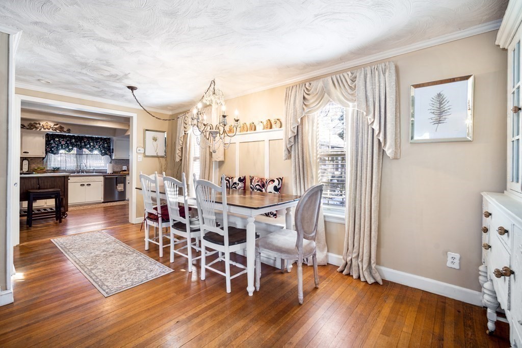 5 Mayfield Street Springfield, MA 01108 - Photo 13 of 30 a view of a dining room with furniture and wooden floor