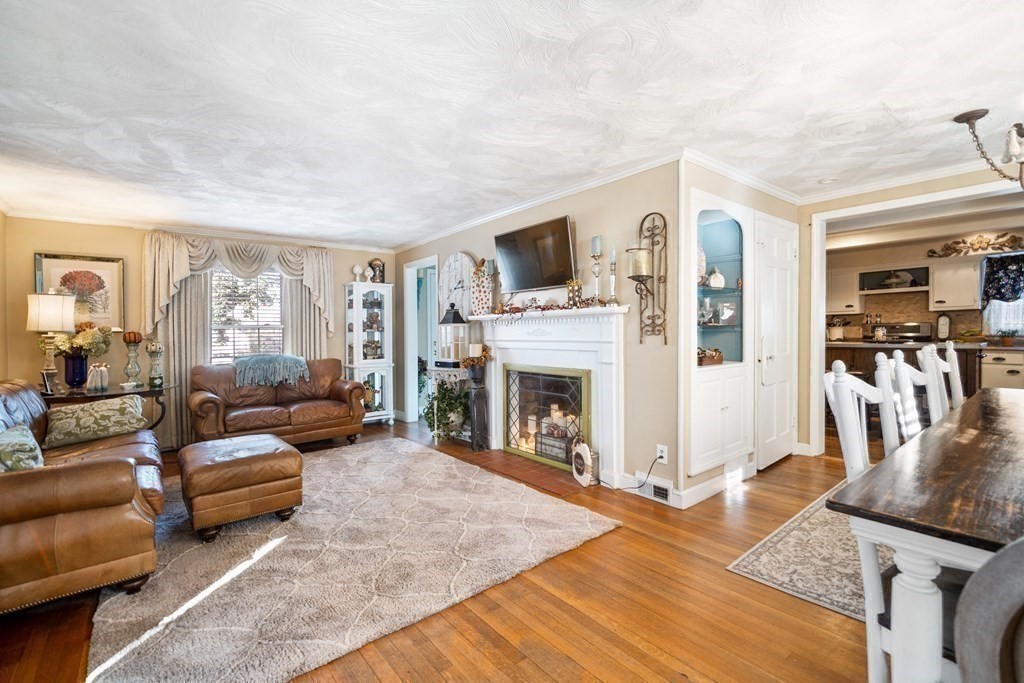 5 Mayfield Street Springfield, MA 01108 - Photo 15 of 30 a living room with furniture and a fireplace