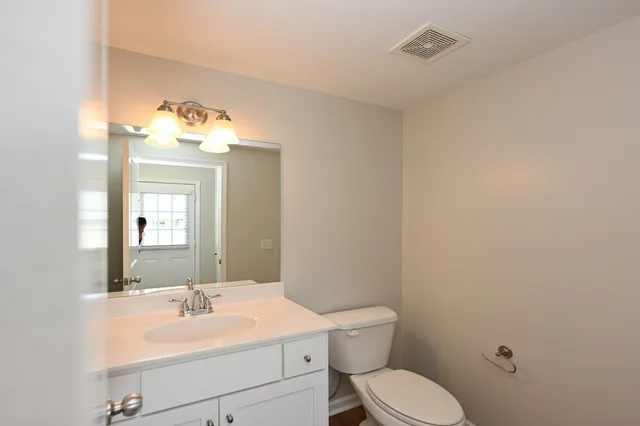 a view of a bedroom with closet