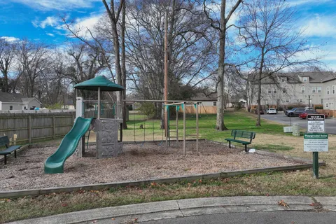 a view of a park with swings