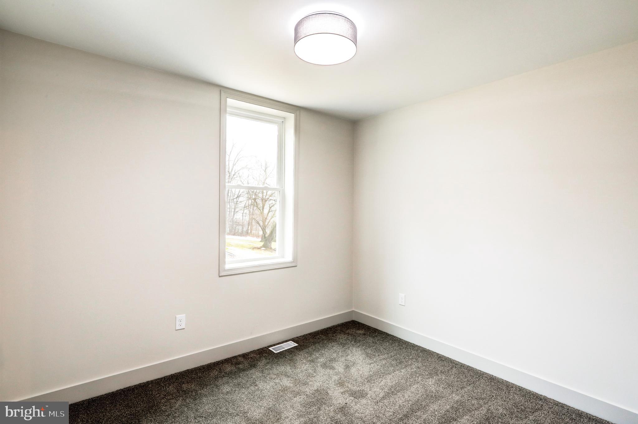 206 Moulstown Road Abbottstown, PA 17301 - Photo 16 of 30 an empty room with a window